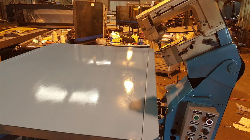 Rebuilt tape edge table with a stainless top