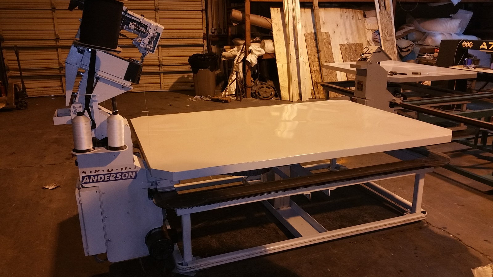 Rebuilt tape edge machine with a stainless top